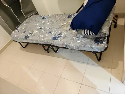 Foldable single guest bed / portable bed with mattress - Pan emirates 4 months old new is for 350