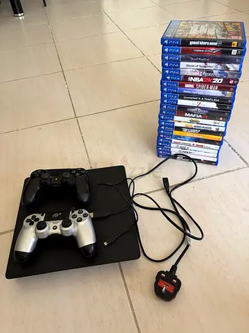 Sony PS4 Slim with 2 Controllers and 22 Games (Ready to Play)