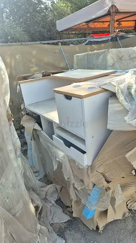 White wooden TV entertainment unit with drawers