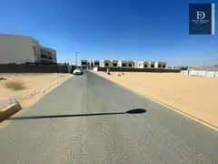 A golden opportunity – a corner plot of land in Al-Raqiba, in an exceptional location and close to