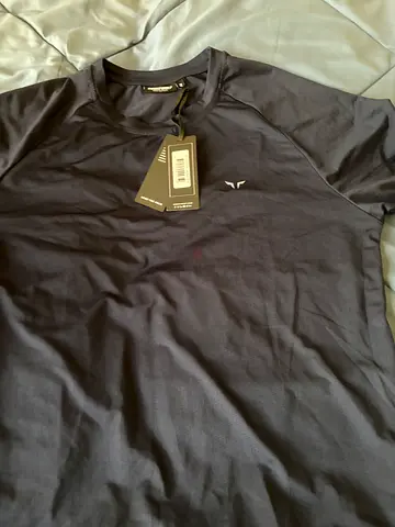 New with tags plain dark grey mens shirt (size tag visible)
