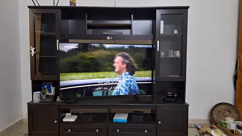 Dark wood TV stand with storage glass door cabinets and drawers