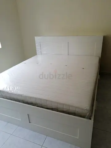 IKEA brimness queen size bed with 4 storage drawers underneath and with IKEA mattress