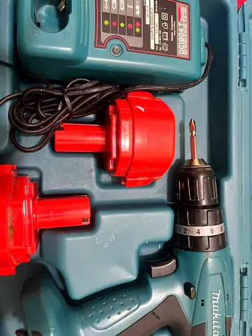 Makita cordless drill kit with two batteries and charger