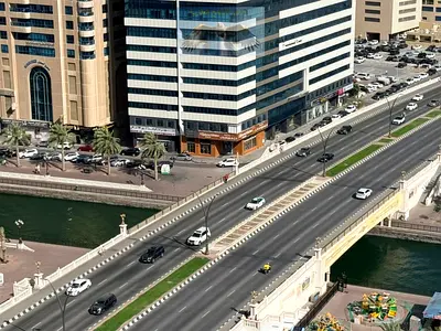 Beautiful 2-bedroom apartment, second tenant – view of Al Qasba Canal – master bedroom – high-quality finishing.