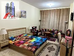 Furnished 2-bedroom apartment with living room for monthly rent in Ajman One Towers - Al Rashidiya I