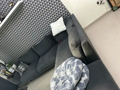 L-shaped grey fabric corner sofa - lightly used