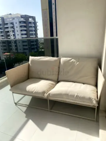 Beige 2-Seater Outdoor/Patio Sofa with Metal Frame - Good Condition