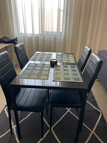Glass Top Dining Table with 4 Black Padded Chairs - All Black