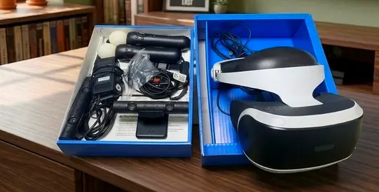 PlayStation VR headset with PlayStation Move controllers and camera with Box