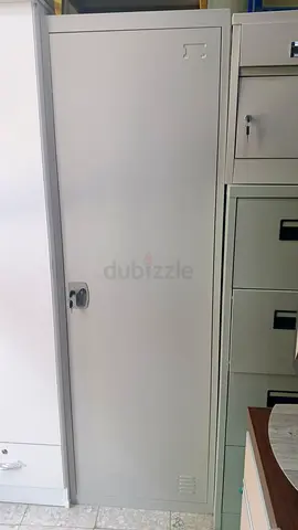 Slim single-door metal storage cabinet