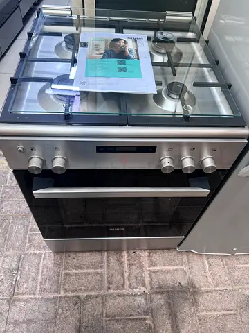 Stainless Steel Freestanding Gas Range with Oven - Good Condition