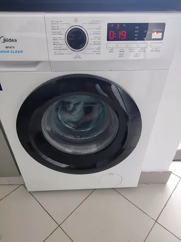 Midea Front Load Washing Machine - move out sale.  11 months old.