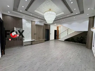 Luxury villa for rent in Al Helio 2, first tenant, 5BR, majlis, living, private pool, rooftop, AED 150K, 4 payments, prime location.