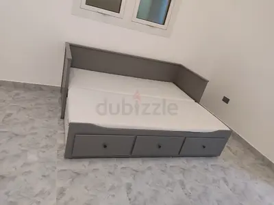 IKEA Hamnes day bed with 3 big storage drawers underneath and with 2 IKEA mattresses