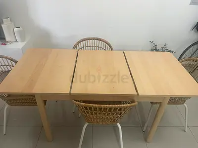 Light wood extendable dining table - seats 4-6, good condition. 500 AED only!