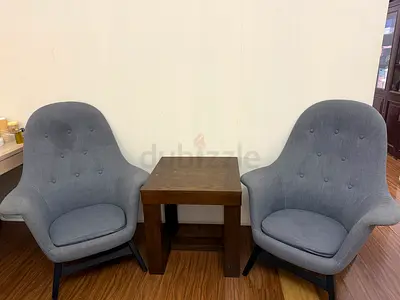 Pair of Gray Upholstered Lounge Chairs with Wooden Side Table