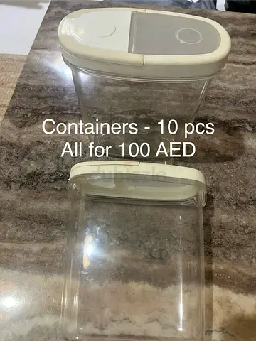Set of 10 Clear Plastic Kitchen Containers with Flip Lids - 100 AED for All