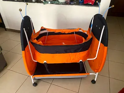 Orange Portable Baby Bassinet/Cradle with Wheels
