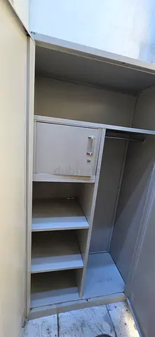 White Metal Storage Cabinet with Shelves and Lockable Compartment