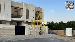 Two-story villa with a roof terrace, including registration and ownership fees, in one of Ajman'