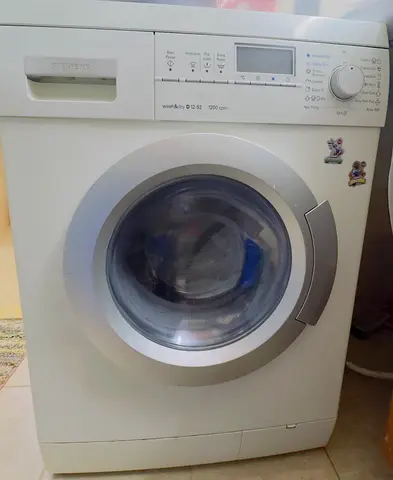 Siemens front-load washer dryer 7kg - good working condition Drum Bearing need to change.