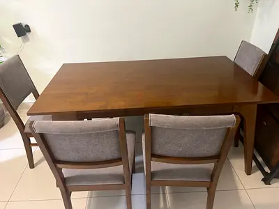 Solid Wood 4-Seater Dining Table with Upholstered Chairs - excellent condition.