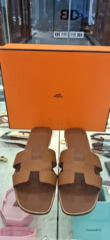 Brown leather slide sandals (Hermès-style) with box — size likely EU 38–39