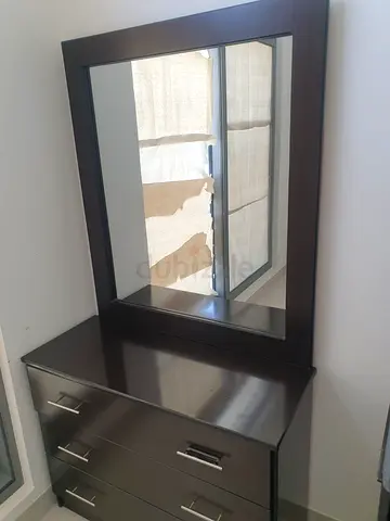 Dressing Table with Drawers – AED 100 Compact dressing table with built-in drawers at the bottom