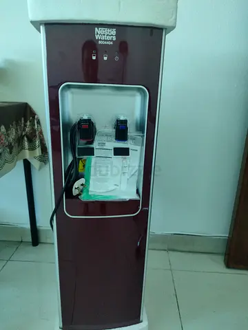 Nestle Standing Water Dispenser / HOT  Cold with bilt in compressor.