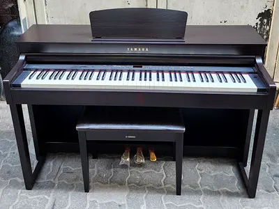 The Yamaha Clavinova CLP-430R (Rosewood) is a discontinued, high-quality digital piano