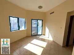 For annual rent in Ajman, one bedroom and living room, Al Naeema 2, King Faisal Street, 24,000 AED