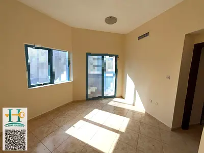 For annual rent in Ajman, one bedroom and living room, Al Naeema 2, King Faisal Street, 24,000 AED