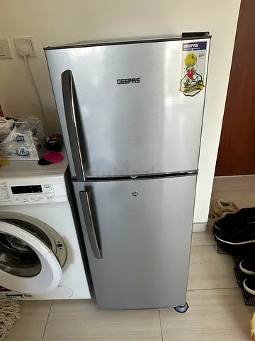 Used Double-Door Refrigerator with Freezer — Good Working Condition