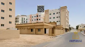 Residential investment land with buildings (G+4), near Hafiz Ibrahim Street in Al Na'imiyah 1, A