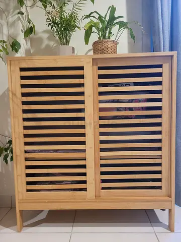 Bamboo storage cabinet with slatted doors