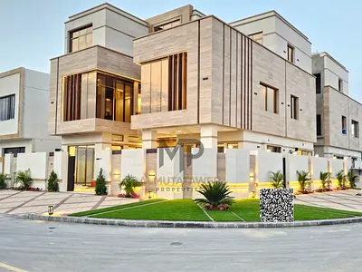 A luxurious corner villa located directly opposite Al Hamidiya Park. The price includes the swimming pool, air conditioning, electricity, water, and r