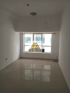 Studio in Pearl Towers, Al Rashidiya 1, large space, semi-separated kitchen, central AC, free mainte