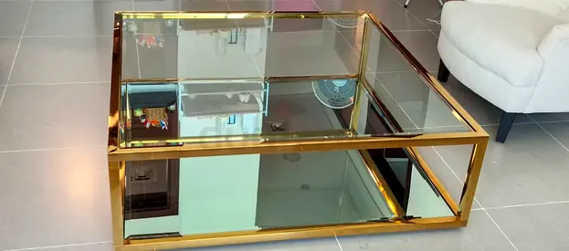 Glass coffee table with gold metal