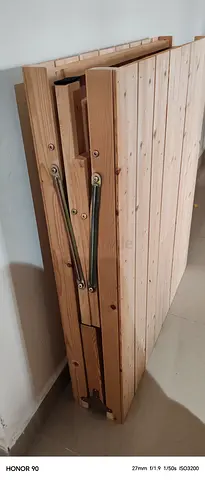 Wooden folding bed