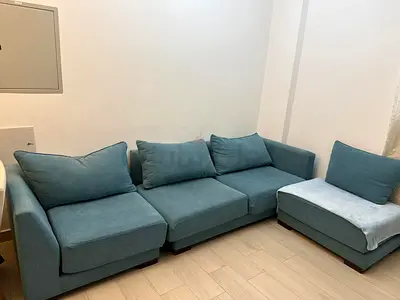 Light teal 4-piece modular sofa (good condition)
