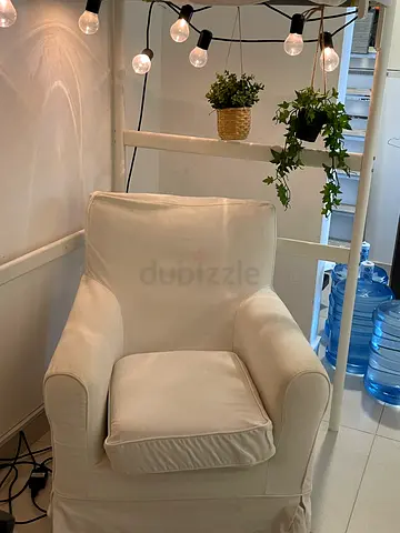 Comfortable white upholstered armchair (single seater)