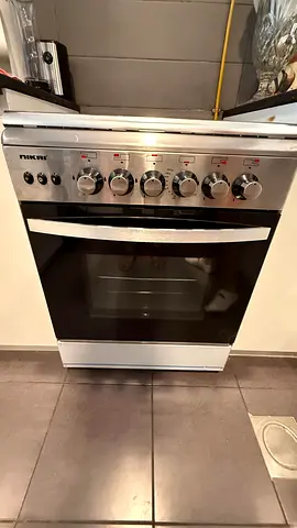 Nikai 4-Burner Gas Cooker with Oven – Good Working Condition