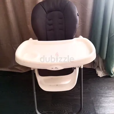 Used baby high chair with removable tray — good condition