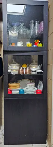Tall Black Display Cabinet with Glass Doors — Good Condition