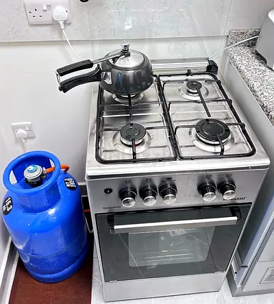 Used 4-Burner Gas Cooker with Oven and LPG Cylinder