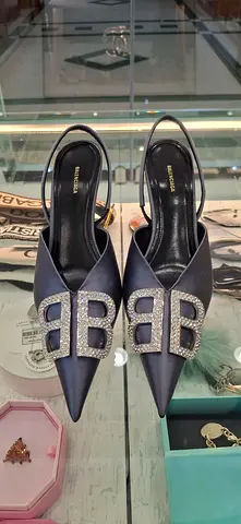Balenciaga black pointed slingback heels with crystal BB buckle, size unstated