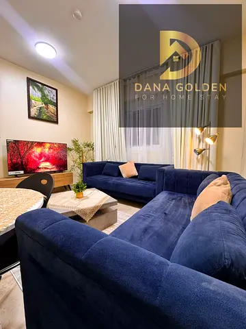 For monthly rent: One bedroom and living room, first occupancy, fully furnished with internet, in a new tower in Sharjah, Al Qasimia area.