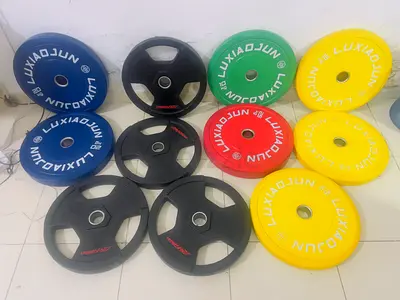 Set of Olympic weight plates (bumper plates) - various sizes