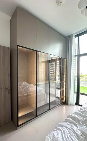Ready for immediate collection - Modern wardrobe with glass display doors and integrated lighting